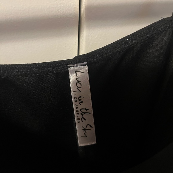 Lucy in the Sky black mini dress with a cutout in the stomach - Picture 2 of 3